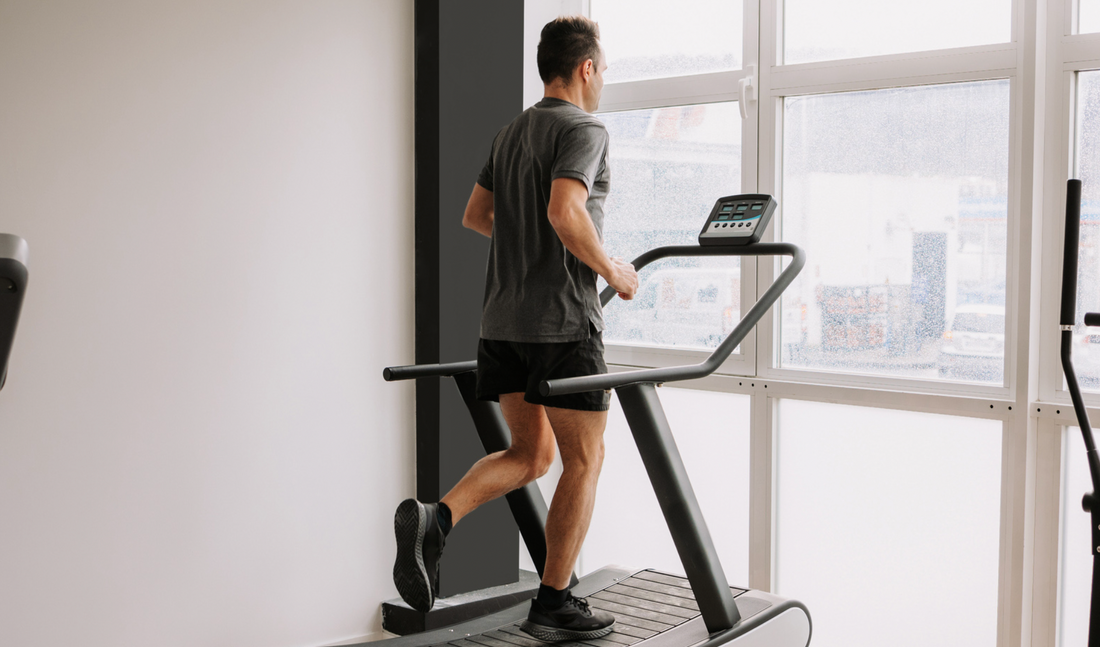 Man Running On Treadmill